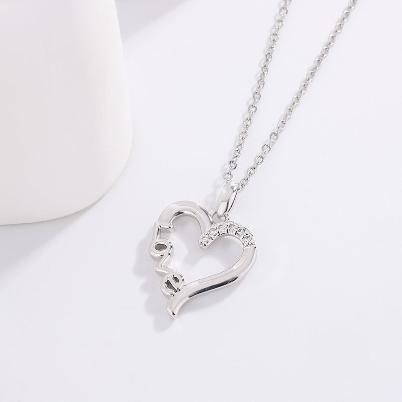 Collar con colgante de acero de titanio con diseño de corazón creativo LOVE