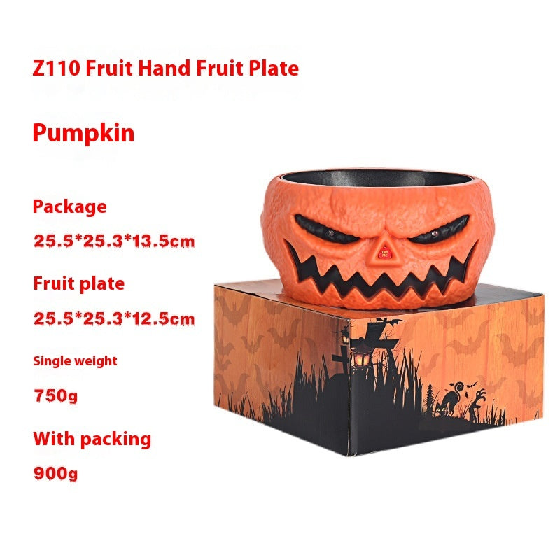 Cuenco de calabaza de plástico para dulces de Halloween con mano que se activa por movimiento.
