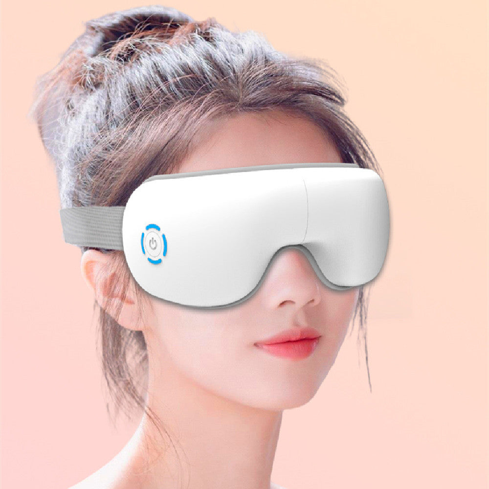 Masajeador de ojos con compresas calientes y música con vibración.