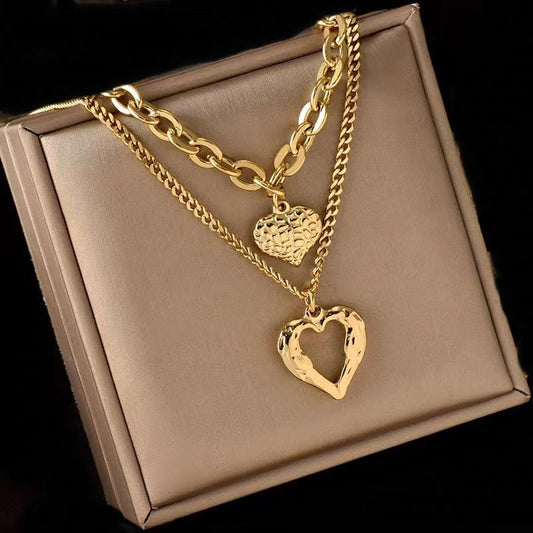 Collar de alas de ángel de acero de titanio, con dije de corazón