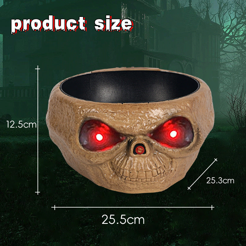 Cuenco de calabaza de plástico para dulces de Halloween con mano que se activa por movimiento.