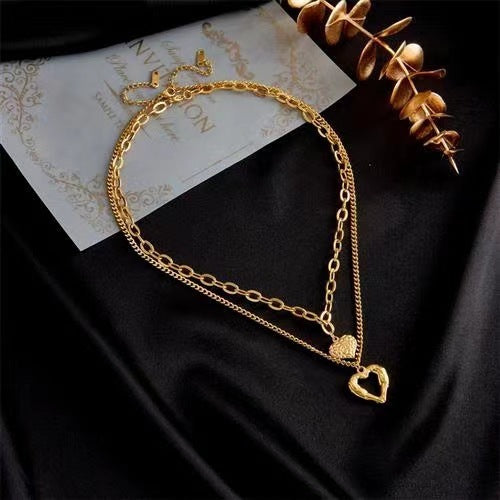 Collar de alas de ángel de acero de titanio, con dije de corazón