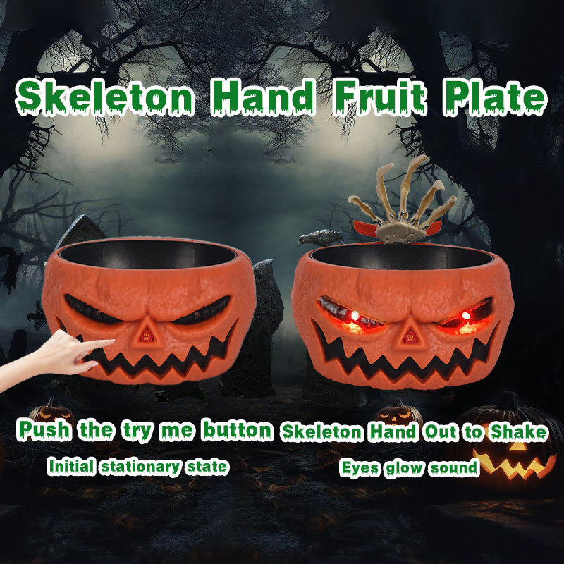 Cuenco de calabaza de plástico para dulces de Halloween con mano que se activa por movimiento.
