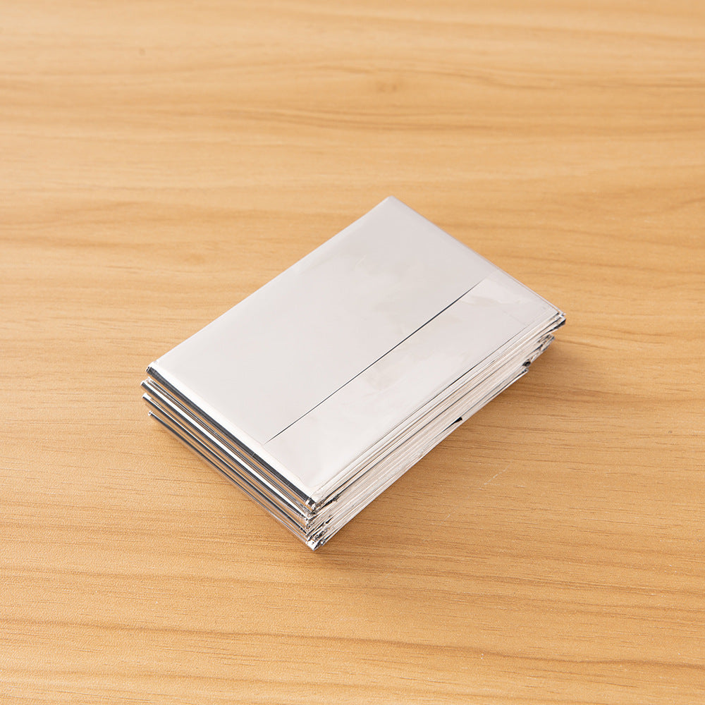 Manta de emergencia para exteriores, portátil, térmica, de doble cara, color plata, para supervivencia