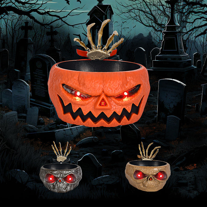 Cuenco de calabaza de plástico para dulces de Halloween con mano que se activa por movimiento.
