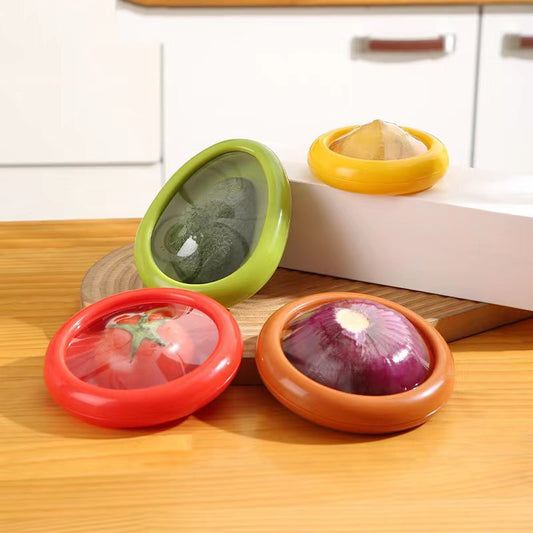 Cajas con película transparente para conservar frutas y verduras frescas, utensilios de cocina.