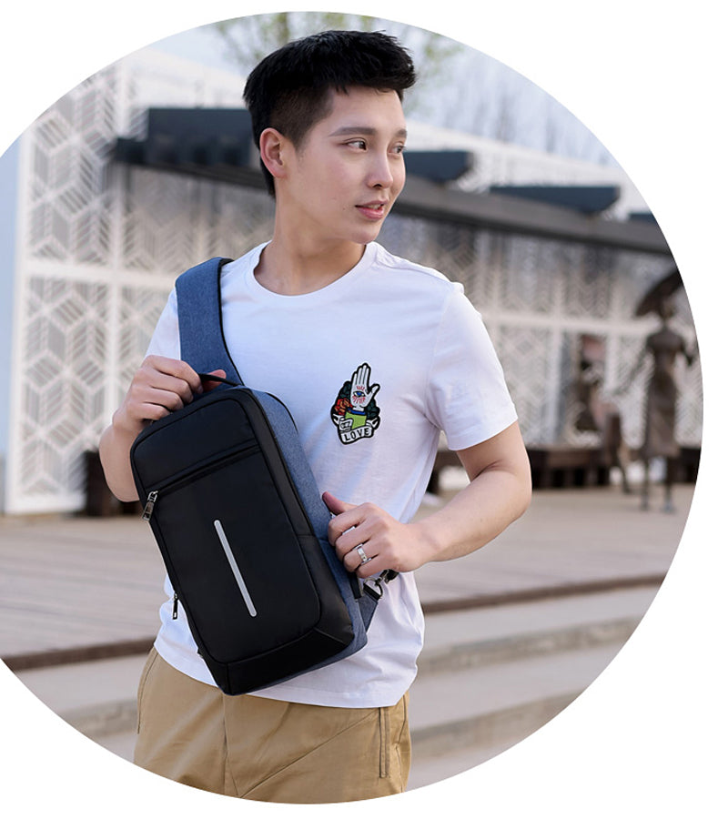 Mochila con vista al frente en el pecho, para carga USB antirrobo 19 cm x 36 cm