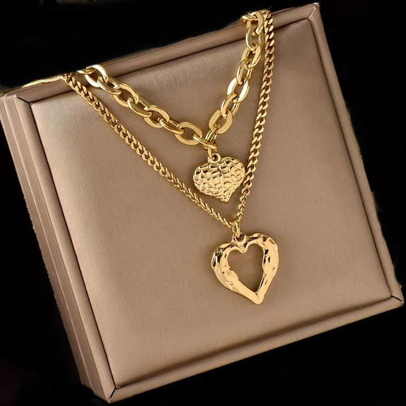 Collar de alas de ángel de acero de titanio, con dije de corazón