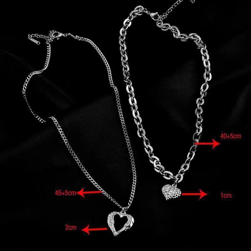 Collar de alas de ángel de acero de titanio, con dije de corazón