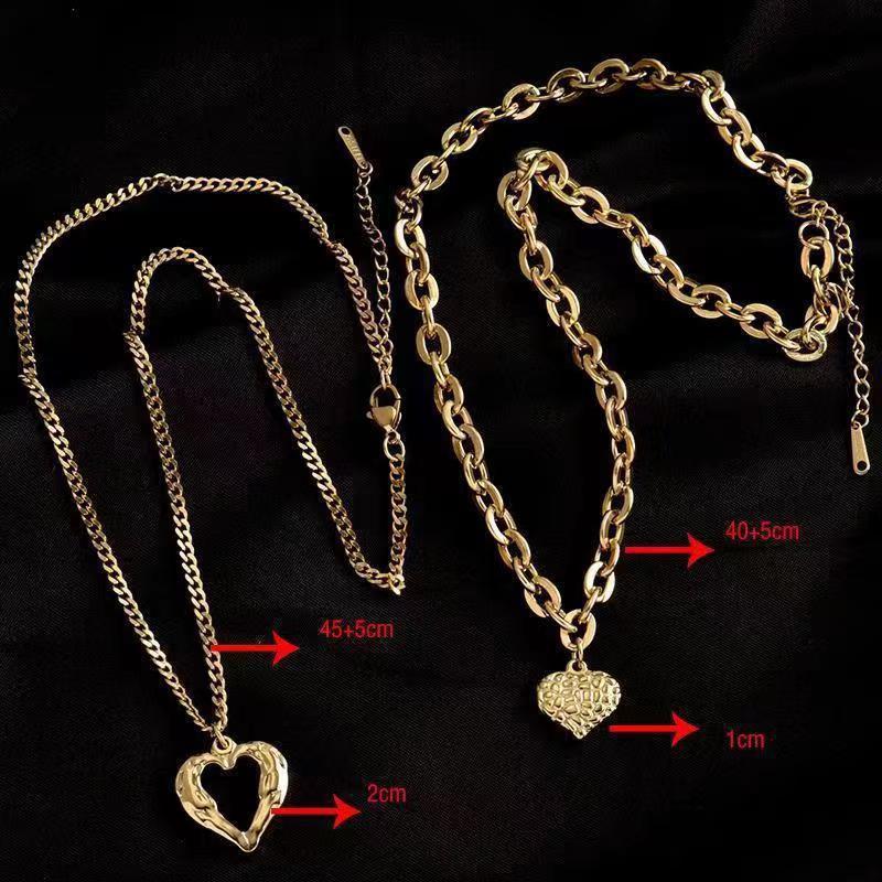 Collar de alas de ángel de acero de titanio, con dije de corazón